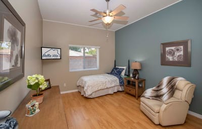 Cozy private room with bed and seating area
