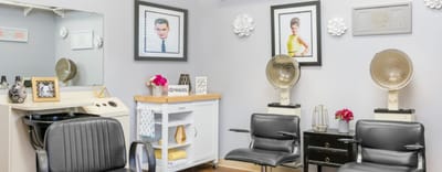 Interior view of a hair salon with styling chairs