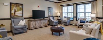 Bright common area with seating and decor