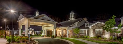 Benton House of Decatur, assisted living in Decatur, GA — Senior living facility entrance illuminated at night