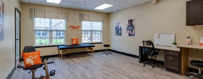 Bright, empty activity room with furniture