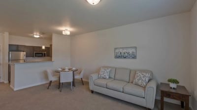 Cedar Ridge Village, nursing home in West Des Moines, IA — Modern living room with dining area and kitchenette
