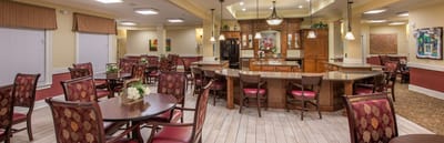 Cozy dining area with tables and chairs