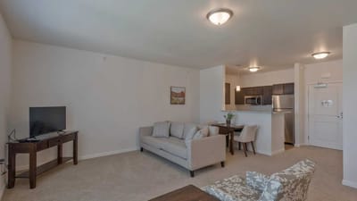 Cedar Ridge Village, nursing home in West Des Moines, IA — Living room of a senior apartment with furniture