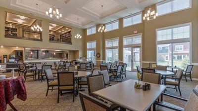 Cedar Ridge Village, nursing home in West Des Moines, IA — Dining area with tables and large windows