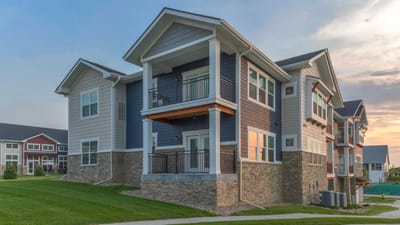 Cedar Ridge Village, nursing home in West Des Moines, IA — Modern senior living complex with multiple balconies
