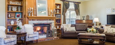 Cozy interior lounge with comfortable seating and fireplace