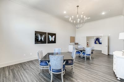 Bright common area with tables and chairs