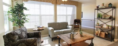 Bright common area with seating and natural light