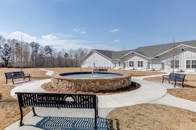 Serene outdoor space with benches and a fountain