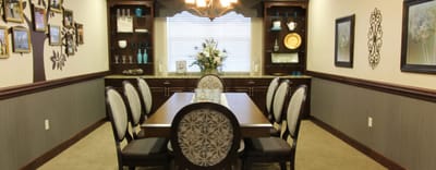 Interior view of a dining area with a table and chairs
