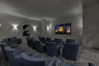 Seating area in a cozy movie theater room