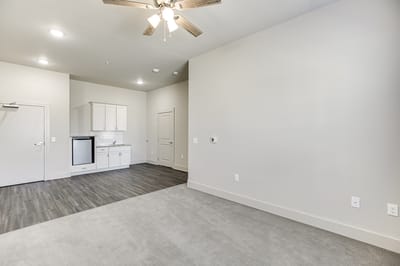 Interior view of a resident room with kitchen area