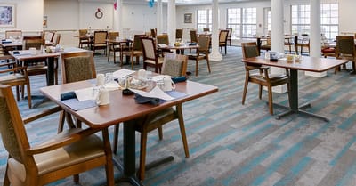 Dining area with tables set for meals