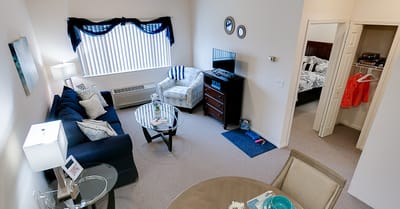 Interior of a private resident room with living area