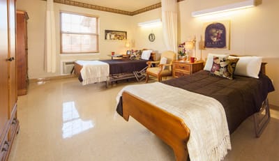 Interior view of a shared resident room with two beds