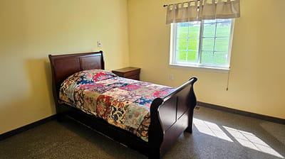 Cozy private room with a bed and window