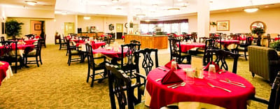 Interior dining room with tables set for meals