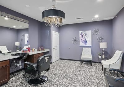 Hair salon interior with stylish decor and chairs