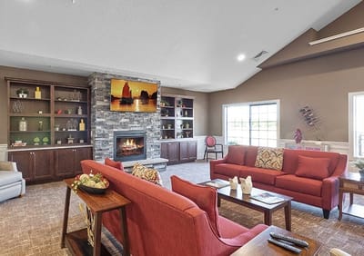 Cozy common area with comfortable seating and a fireplace