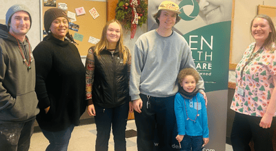 Staff and residents celebrating together in a common area