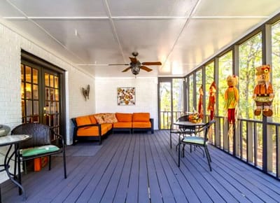 Cozy common area with orange seating and decorations