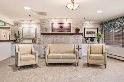 Bright common area with seating and artwork