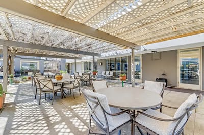 Outdoor patio area with shaded seating