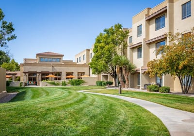 Exterior view of Fairwinds – Rio Rancho with landscaped lawn