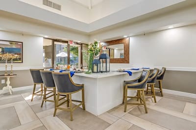 Dining area with tables and decorative centerpiece