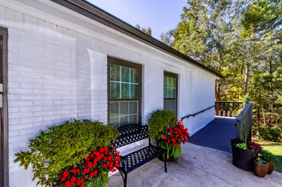Well-kept outdoor seating area with flowers