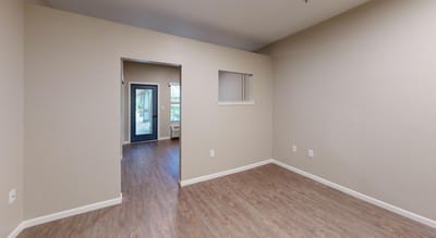 A spacious interior resident room in bright colors