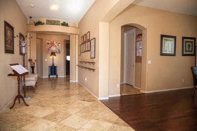 Bright hallway in a senior living facility with seating