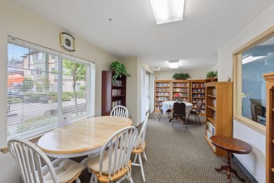 Interior of a cozy common area with bookshelves