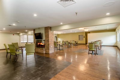 Common area with seating and fireplace
