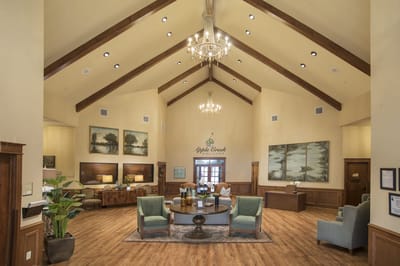 Bright and spacious common area with seating and decor
