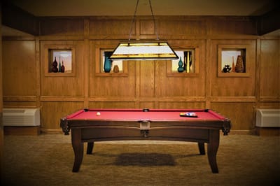 Interior game room with a pool table