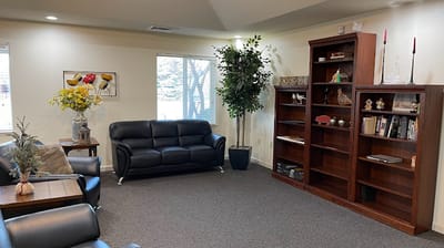 Bright common area with comfortable seating and decor