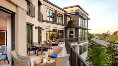 Exterior view of a modern terrace with seating
