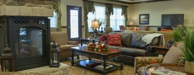 Cozy common area with comfortable seating and fireplace