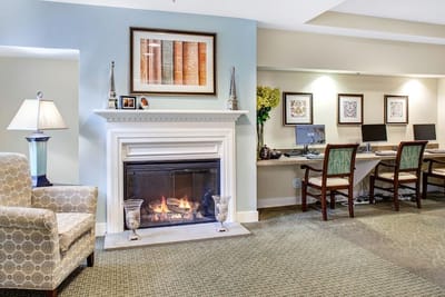Cozy common area with a fireplace and seating