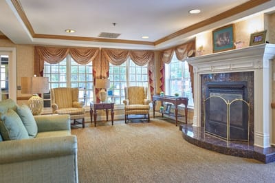 Cozy common area with comfortable seating and a fireplace