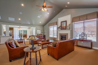 Common area with comfortable seating and large windows