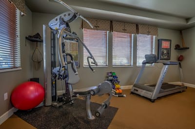 Interior view of a fitness area with exercise equipment