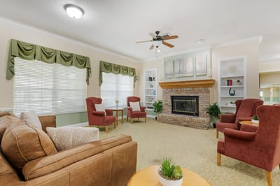 Cozy common area with seating and a fireplace