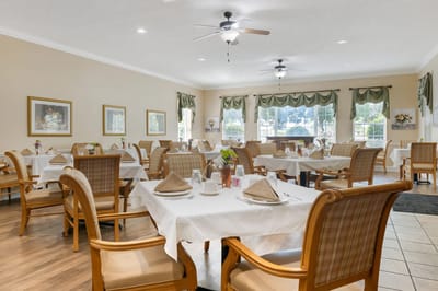 Bright dining room with neatly set tables