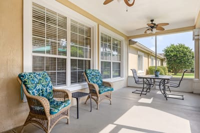 Outdoor seating area with chairs and table