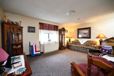 Cozy interior of a resident's room with furniture