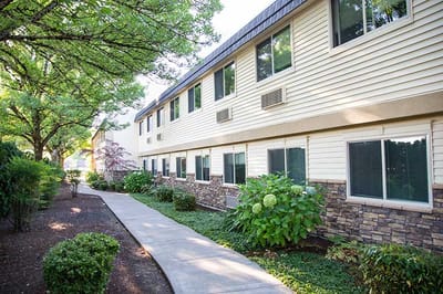 Pathway alongside the exterior of the retirement community building