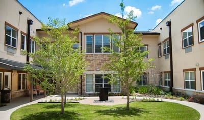 Exterior view of a senior living facility courtyard